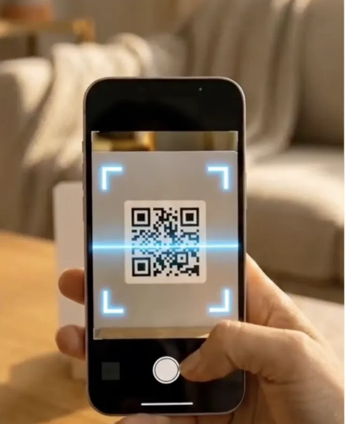 A phone scanning The Ark's QR code to join the family